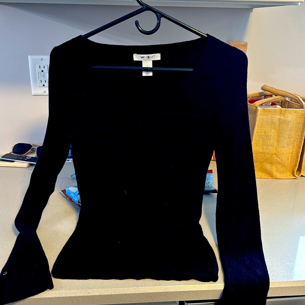 Fitted black sweater size Small, excellent condition.